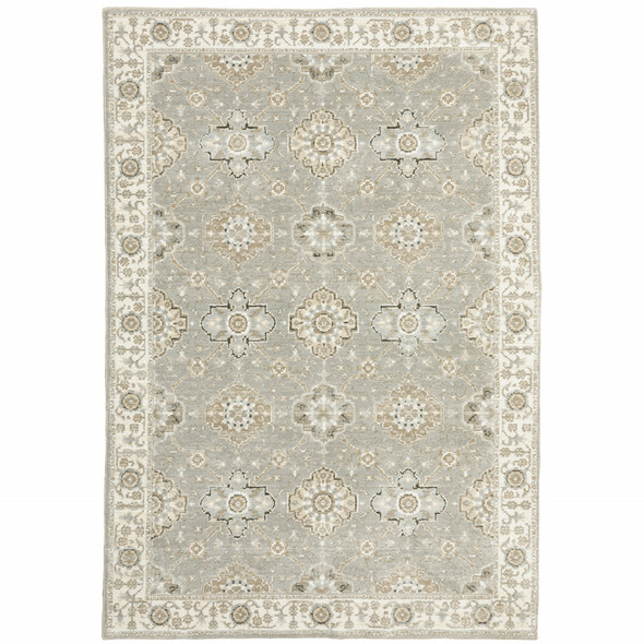 6' X 9' Grey Ivory Tan Brown And Gold Oriental Power Loom Stain Resistant Area Rug