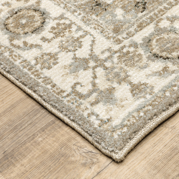6' X 9' Grey Ivory Tan Brown And Gold Oriental Power Loom Stain Resistant Area Rug