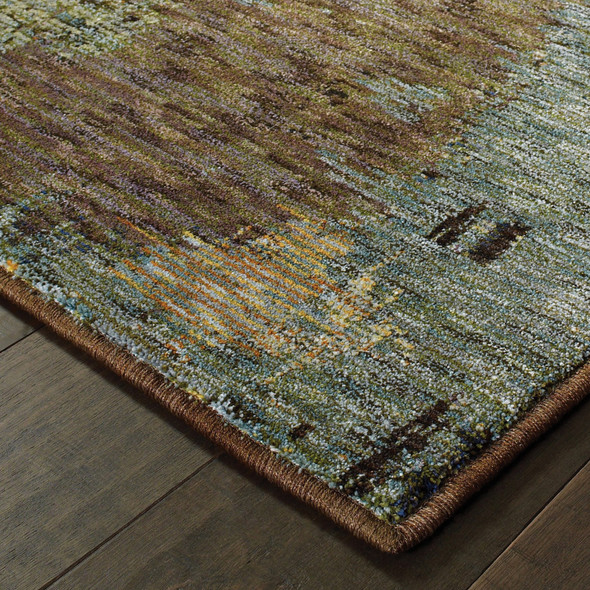 5' X 7' Blue And Brown Abstract Power Loom Stain Resistant Area Rug