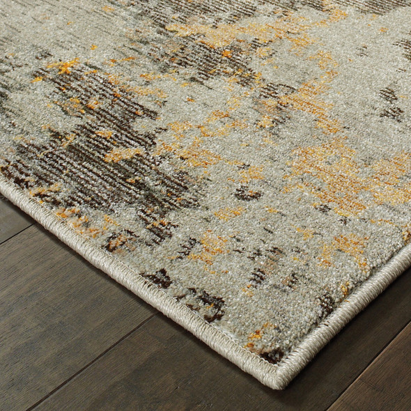 5' X 7' Grey And Gold Abstract Power Loom Stain Resistant Area Rug