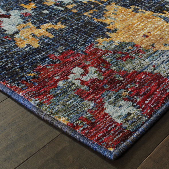 5' X 7' Blue And Red Abstract Power Loom Stain Resistant Area Rug