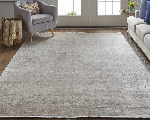5' X 8' Tan Ivory And Gray Abstract Power Loom Distressed Area Rug With Fringe