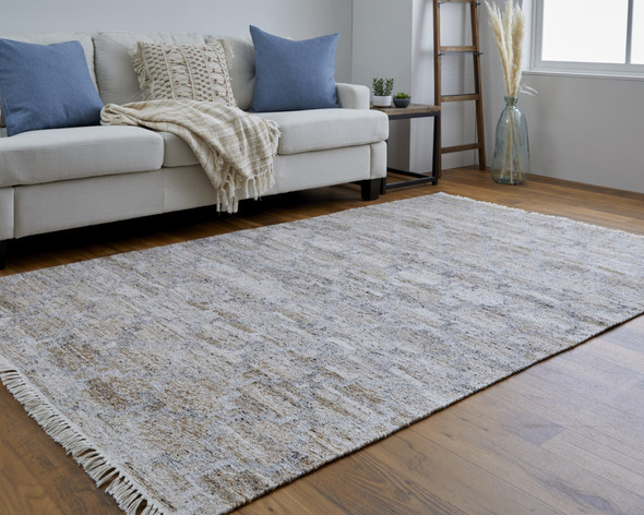 10' X 13' Tan Gray And Ivory Geometric Hand Woven Stain Resistant Area Rug With Fringe