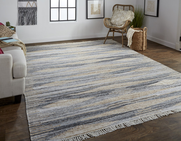 4' X 6' Gray Tan And Silver Abstract Hand Woven Stain Resistant Area Rug With Fringe