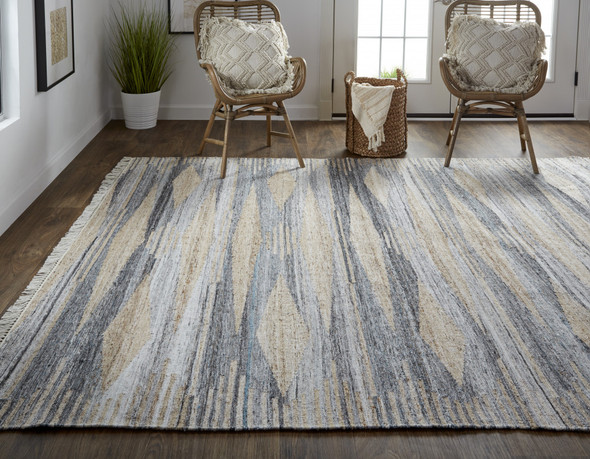 4' X 6' Gray Tan And Silver Abstract Hand Woven Stain Resistant Area Rug With Fringe