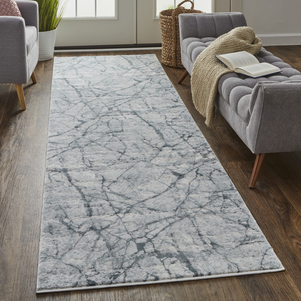 10' Blue Gray And Ivory Abstract Distressed Stain Resistant Runner Rug