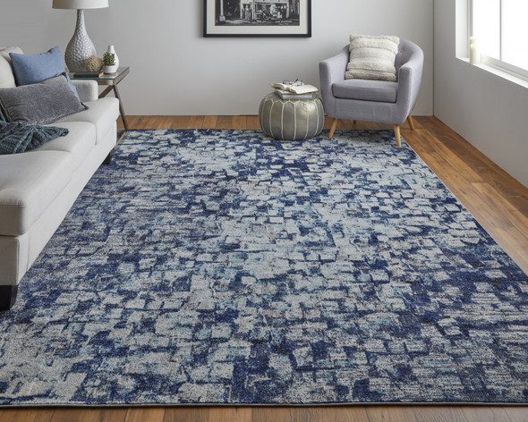 9' X 12' Blue And Ivory Abstract Power Loom Distressed Stain Resistant Area Rug