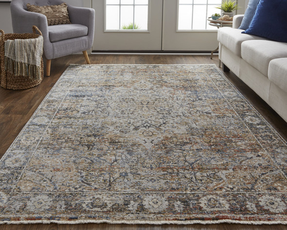 5' X 8' Tan Orange And Blue Floral Power Loom Distressed Area Rug With Fringe