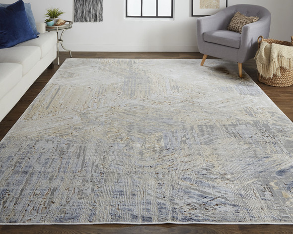 8' X 10' Tan Ivory And Gray Abstract Power Loom Distressed Area Rug