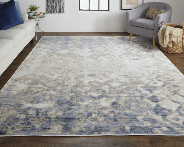 2' X 3' Tan Ivory And Blue Abstract Power Loom Distressed Area Rug