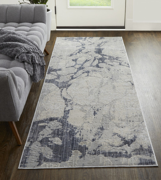 8' Ivory And Blue Abstract Power Loom Distressed Runner Rug