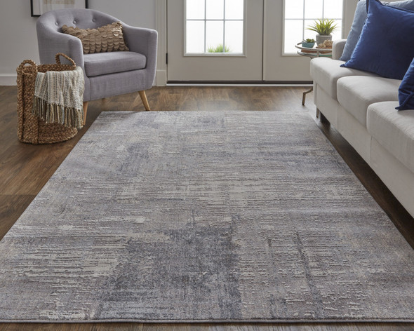 2' X 3' Taupe Tan And Blue Abstract Power Loom Distressed Stain Resistant Area Rug