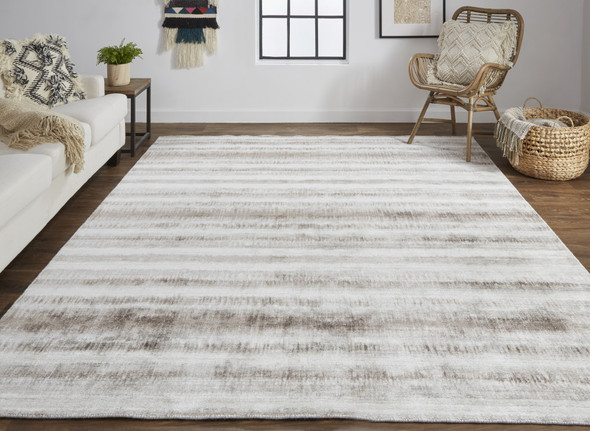 5' X 8' Tan Ivory And Brown Abstract Hand Woven Area Rug