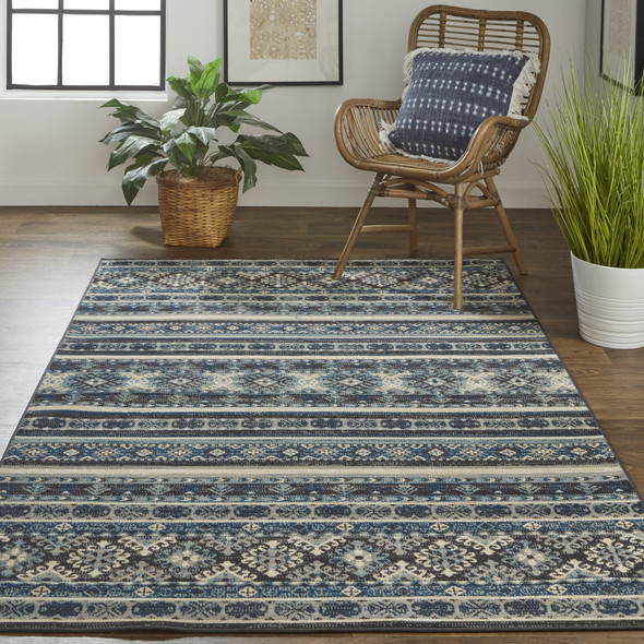 8' X 11' Blue Tan And Black Geometric Power Loom Distressed Stain Resistant Area Rug