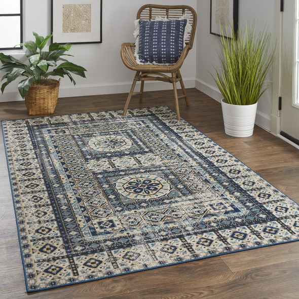 8' X 11' Ivory Tan And Blue Abstract Power Loom Distressed Stain Resistant Area Rug