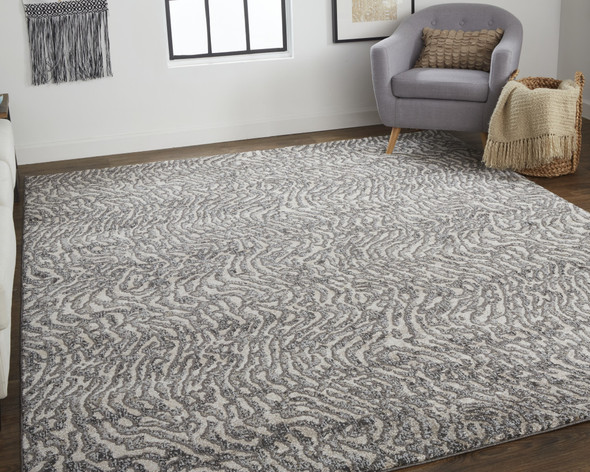 7' X 10' Gray Taupe And Ivory Abstract Power Loom Stain Resistant Area Rug