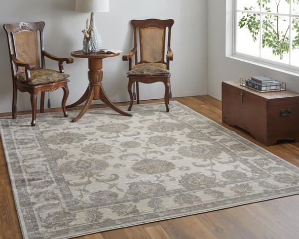 5' X 8' Tan Ivory And Brown Power Loom Area Rug