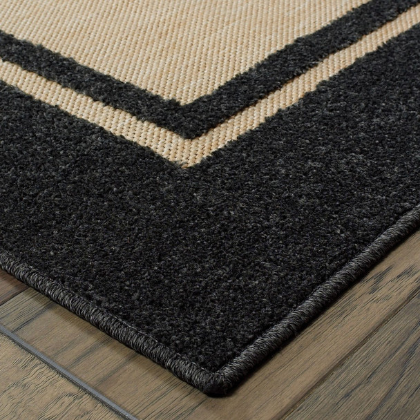 6' x 9' Sand and Black Border Indoor Outdoor Area Rug