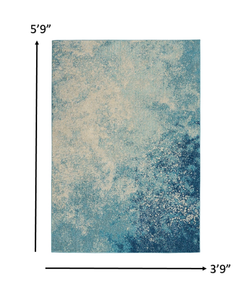 4 x 6 Light Blue and Ivory Abstract Sky Area Rug