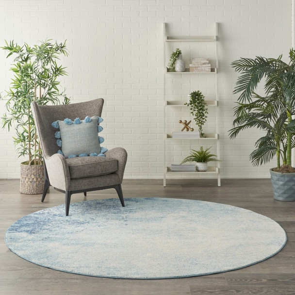 8 Round Light Blue and Ivory Abstract Sky Area Rug