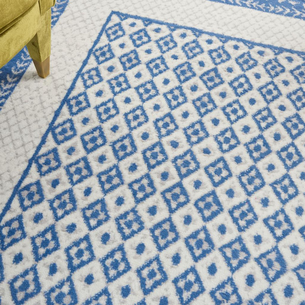 6 x 9 Ivory and Blue Geometric Area Rug