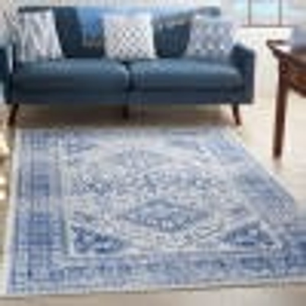 6 x 9 Ivory and Navy Geometric Area Rug