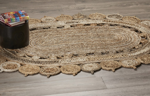 7 Oval Shaped Natural Toned Area Rug