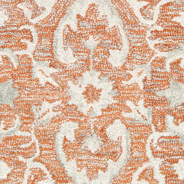 5 x 8 Orange and Ivory Medallion Area Rug