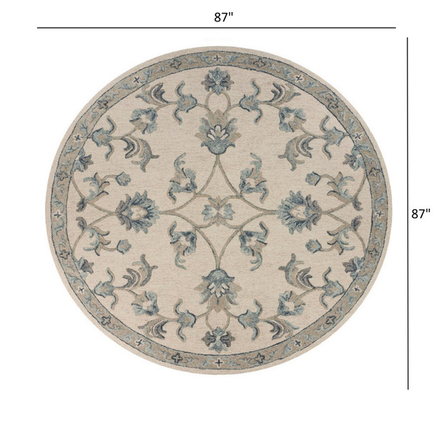 7 Round Beige and Blue Filigree Area Rug