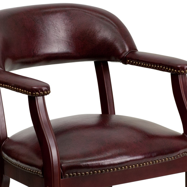 Diamond Oxblood Vinyl Luxurious Conference Chair with Accent Nail Trim