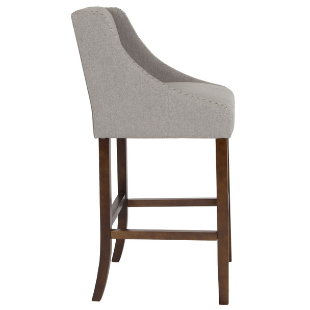 Carmel Series 30" High Transitional Walnut Barstool with Accent Nail Trim in Light Gray Fabric