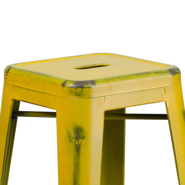 Kai Commercial Grade 30" High Backless Distressed Yellow Metal Indoor-Outdoor Barstool