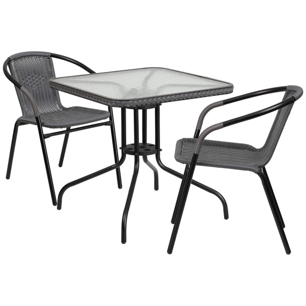 Lila 28'' Square Glass Metal Table with Gray Rattan Edging and 2 Gray Rattan Stack Chairs