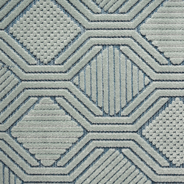 5' X 7' Light Blue And Navy Geometric Stain Resistant Area Rug