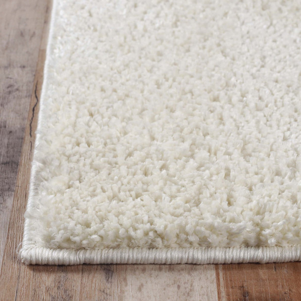 5' X 8' Ivory Shag Stain Resistant Area Rug