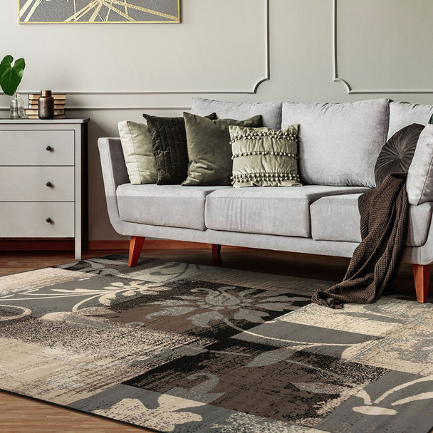 5' X 8' Beige And Gray Floral Power Loom Distressed Stain Resistant Area Rug