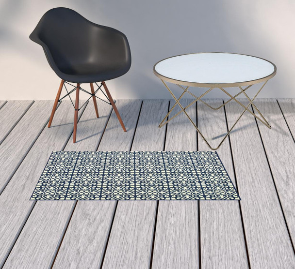 2' X 4' Ivory Geometric Stain Resistant Indoor Outdoor Area Rug