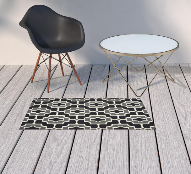 2' X 4' Black Geometric Stain Resistant Indoor Outdoor Area Rug