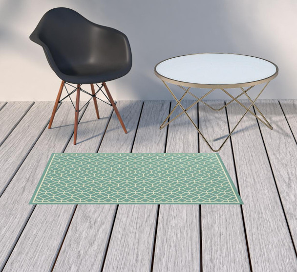 2' X 4' Blue Geometric Stain Resistant Indoor Outdoor Area Rug