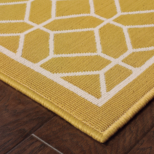 9' X 13' Gold Geometric Stain Resistant Indoor Outdoor Area Rug