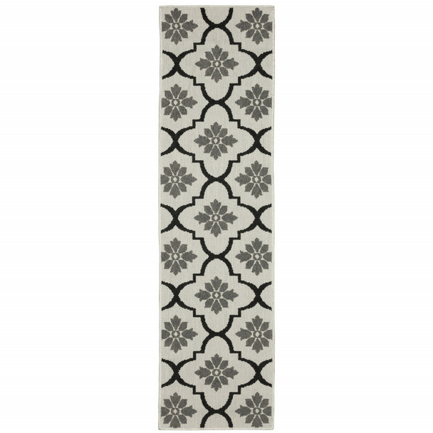 2' X 7' Beige Geometric Stain Resistant Indoor Outdoor Area Rug