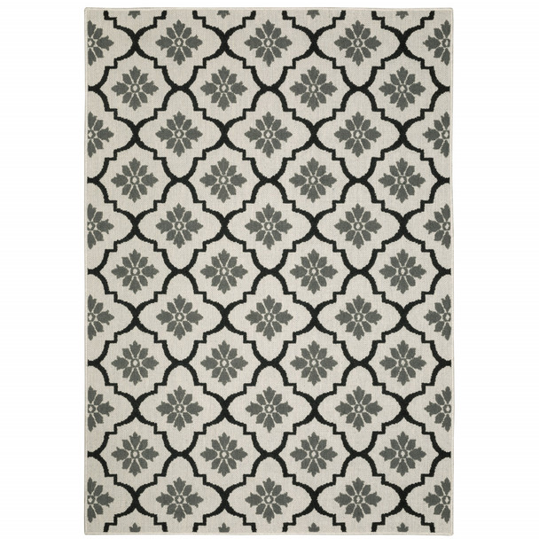 5' X 7' Beige Geometric Stain Resistant Indoor Outdoor Area Rug