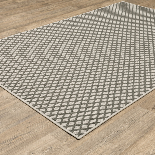 6' X 9' Beige Geometric Stain Resistant Indoor Outdoor Area Rug