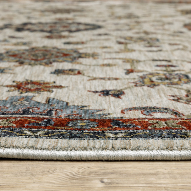 3' X 5' Beige Rust Red Blue Gold And Grey Oriental Power Loom Stain Resistant Area Rug With Fringe