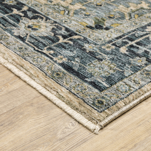 3' X 5' Blue Grey Beige Tan Green And Gold Oriental Power Loom Stain Resistant Area Rug With Fringe