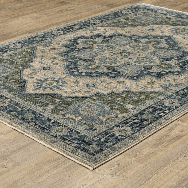 10' X 13' Blue Grey Beige Tan Green And Gold Oriental Power Loom Stain Resistant Area Rug With Fringe