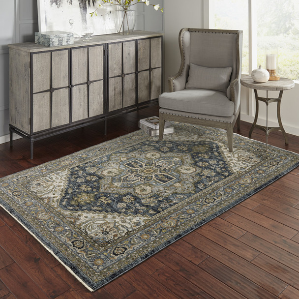 10' X 13' Blue Taupe Grey Green Rust Tan Beige And Gold Oriental Power Loom Stain Resistant Area Rug With Fringe