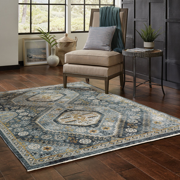 10' X 13' Blue Gold Ivory And Navy Oriental Power Loom Stain Resistant Area Rug With Fringe
