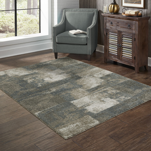 10' X 13' Teal Blue Grey Tan And Beige Geometric Power Loom Stain Resistant Area Rug