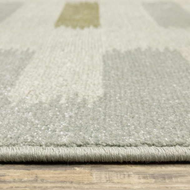 3' X 5' Beige Grey Gold And Green Geometric Power Loom Stain Resistant Area Rug